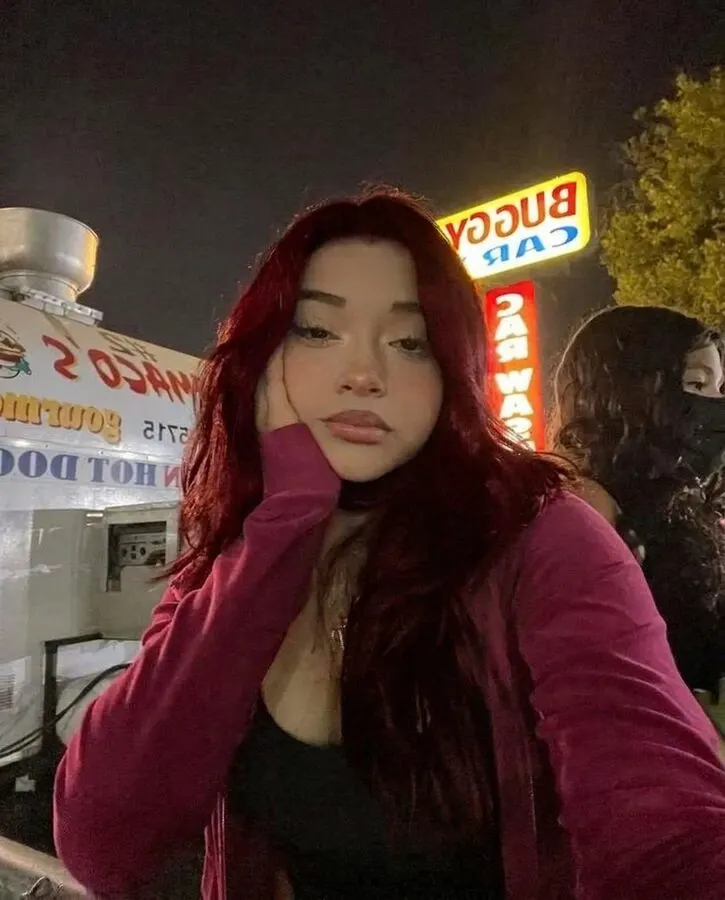 Cherry Cola Hair look: the same selfie with deep cherry-red hair